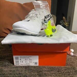 Nike Sprinter shoes w/spikes, tool, and bag